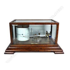 An early 20th century oak and glazed cased barograph, by Baird…