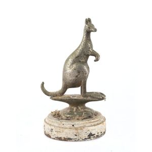 A kangaroo car mascot, chrome finished cast metal on turned…
