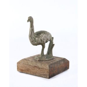 An emu car mascot, chrome finished cast metal on wooden plinth,…
