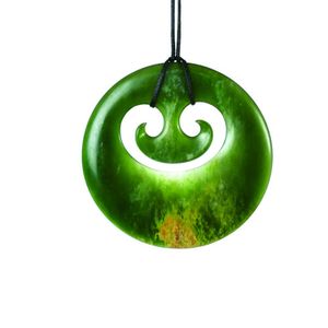 Nephrite pendant, disc form with double koru piercing, diameter&hellip;