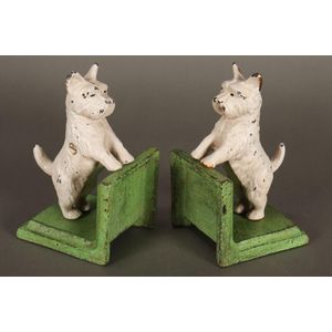Pair of cast bookends, in the form of Scottish terriers, in a…