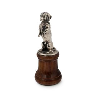 A begging dog car mascot, chromed cast metal on later turned…