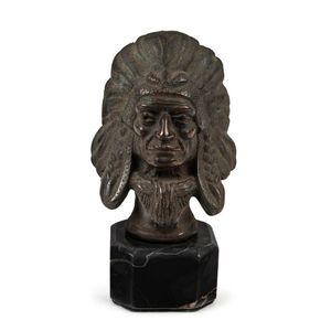 A cast bronze Indian chief car mascot mounted on marble plinth,…
