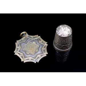 Sterling silver fob medal and thimble. The medal is marked 9ct…
