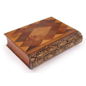 A New Zealand timbers inlaid book box, the spine with a…