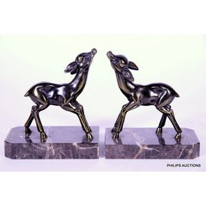 A pair of Art Deco spelter fawn bookends, circa 1930, stylised…