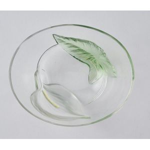 An Art Nouveau glass dish, green lily decoration. Marked '…