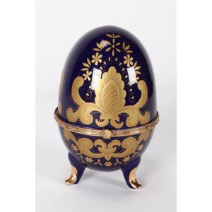 Russian porcelain egg box and cover, in cobalt accented with…