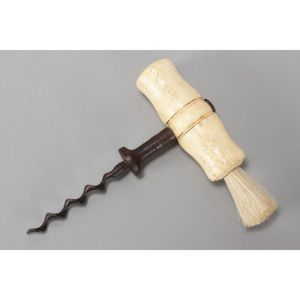 Georgian whale bone ivory corkscrew and brush, with turned…