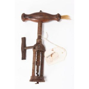 Victorian corkscrew and Dusting brush, with turned wooden…