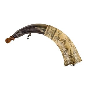 A powder horn with scrimshaw decoration, a barque in full sail,…