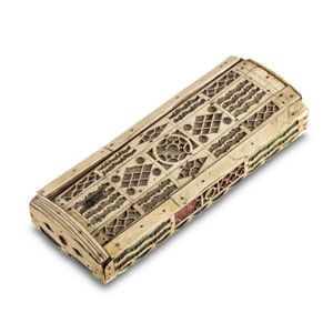 A carved scrimshaw whalebone box with a set of whalebone…