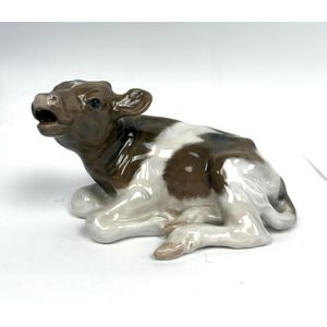 A Royal Copenhagen, Denmark figure of a cow, length 16 cm