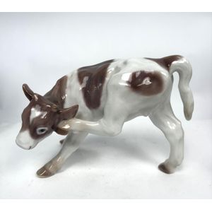 A Royal Copenhagen, Denmark porcelain figure of a cow, no. 432,&hellip;