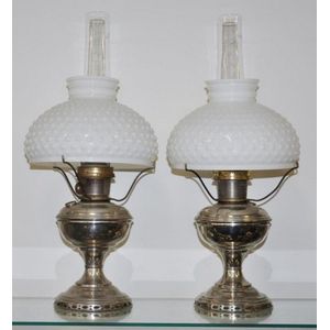 Pair of Aladdin nickel plated oil lamps, 61 cm high including…