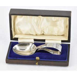 A sterling silver baby spoon, engraved 'John Michael 5.6.27',…
