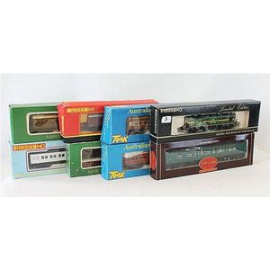 Eight various railway carriages, including TopLink, Powerline…