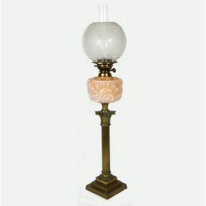 A Victorian kerosene banquet lamp, the brass Corinthian column…
