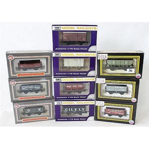 Ten Dapol model freight carriages, including 'Million Iron…