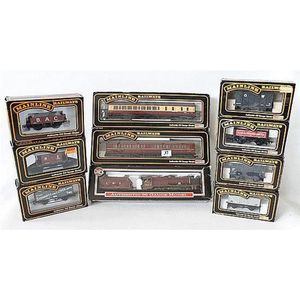 Nine Mainline carriages and freight models, and one Dapol train…