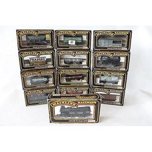 Twelve various Mainline freight models, and a locomotive with…