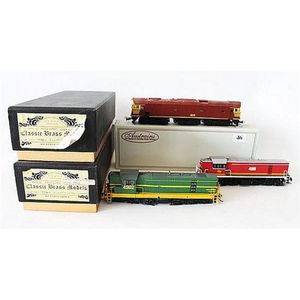 Three model locomotives, two classic brass models and one…