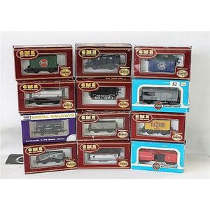 Twelve various freight carriages, including eleven Airfix and…
