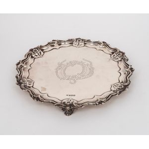 An antique English sterling silver salver, manufactured by…