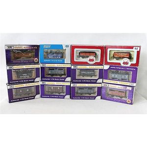 Twelve various Dapol model freight carriages (12), boxed.