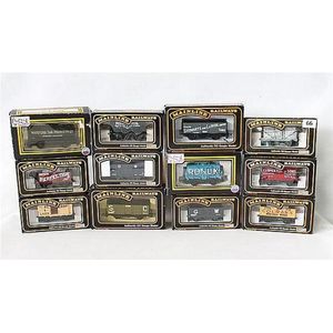 Ten Mainline freight carriage models, and two Dapol freight…