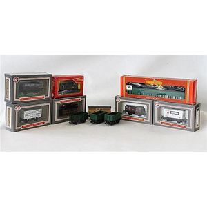 Eleven various freight models and a carriage, Hornby, Dapol and…