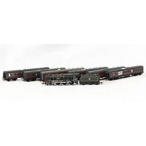 Six Airfix passenger carriages and a locomotive with freight,…