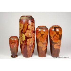 A group of four poker work vases, circa 1920s. Four baluster…