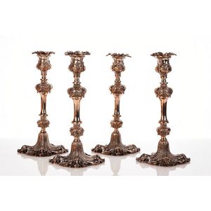 Set of four silver candlesticks, c. 1880, in the rococo style,…