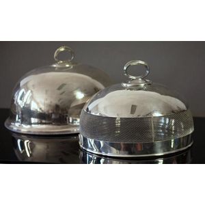 Two various silver plated covered dishes. Both with retractable…