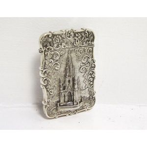 A fine Victorian silver castle top card case with a high relief…