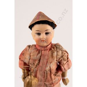Gebruder Kuhnlenz Asian character bisque doll, stationary dark…