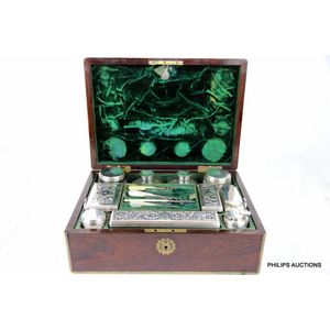 Sold at Auction: Vintage travel vanity case with enamel accessories