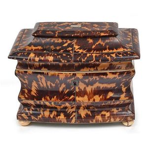 A 19th century tortoiseshell and ivory tea caddy the body of…
