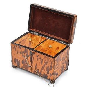 A Victorian tortoiseshell veneered tea caddy rectangular with…