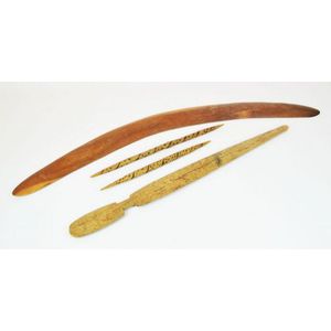 An Aboriginal boomerang, two message sticks and carved token ii.…