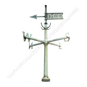 A large old architectural weathervane, constructed of copper…