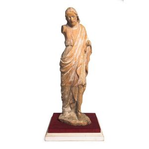 A Franciscan carved figure of John the Baptist, 19th century,…