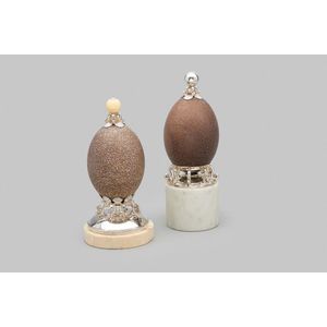Two emu eggs, mounted by Tony White one example with a white…