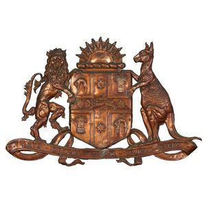 A repousse copper coat of arms of the state of NSW, the shield…