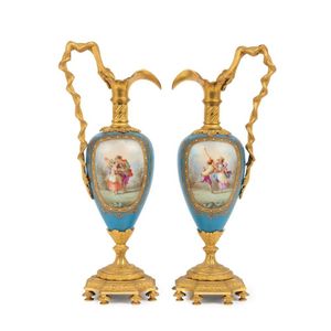 A pair of Louis XV style bleu celeste ground ormolu mounted…