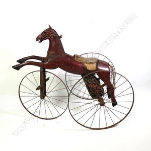A Napoleon III horse toy tricycle c.1870, original distressed…