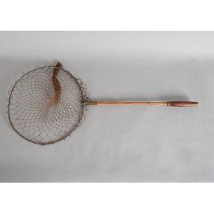 A vintage landing net, bamboo handled with brass caps. Fitted…