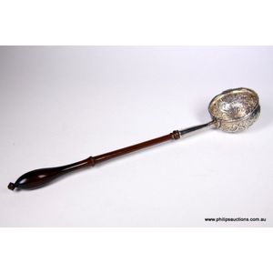 A George II silver coin toddy ladle with a timber handle, early…