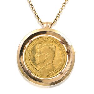 A German gold commemorative coin pendant/brooch, the pure gold…